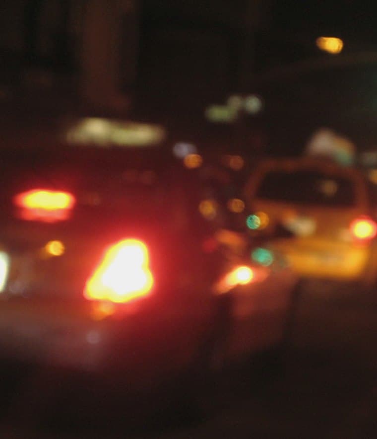 Blurry taxi lights between plans