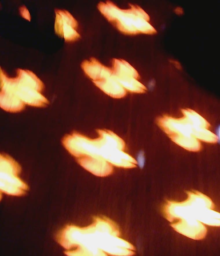 Warm dance floor lights caught out of focus